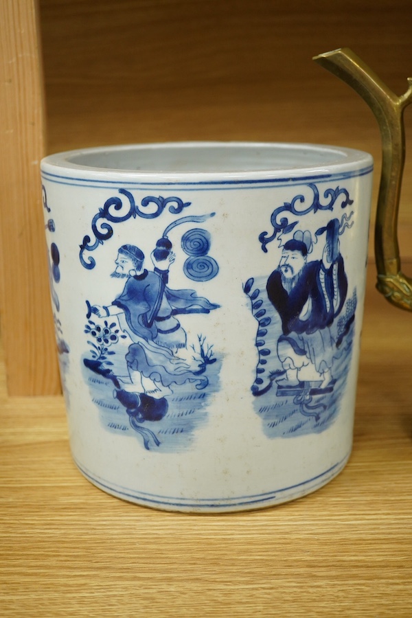 A Chinese cylindrical blue and white brush pot and a brass ewer, largest 39cm high. Condition - fair